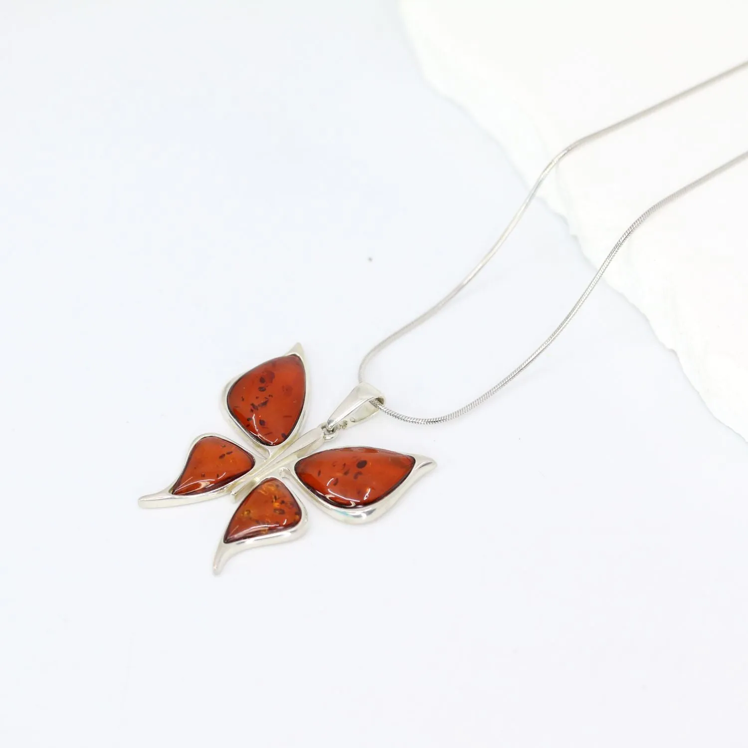 Honey Amber Butterfly Pendant in Sterling Silver